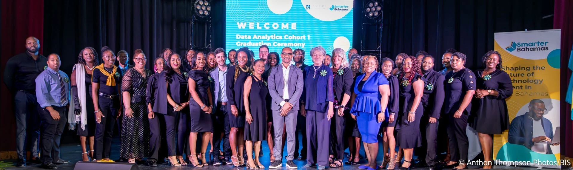 The Data Analytics Cohort 1 graduating class on stage at the Smarter Bahamas graduation ceremony
